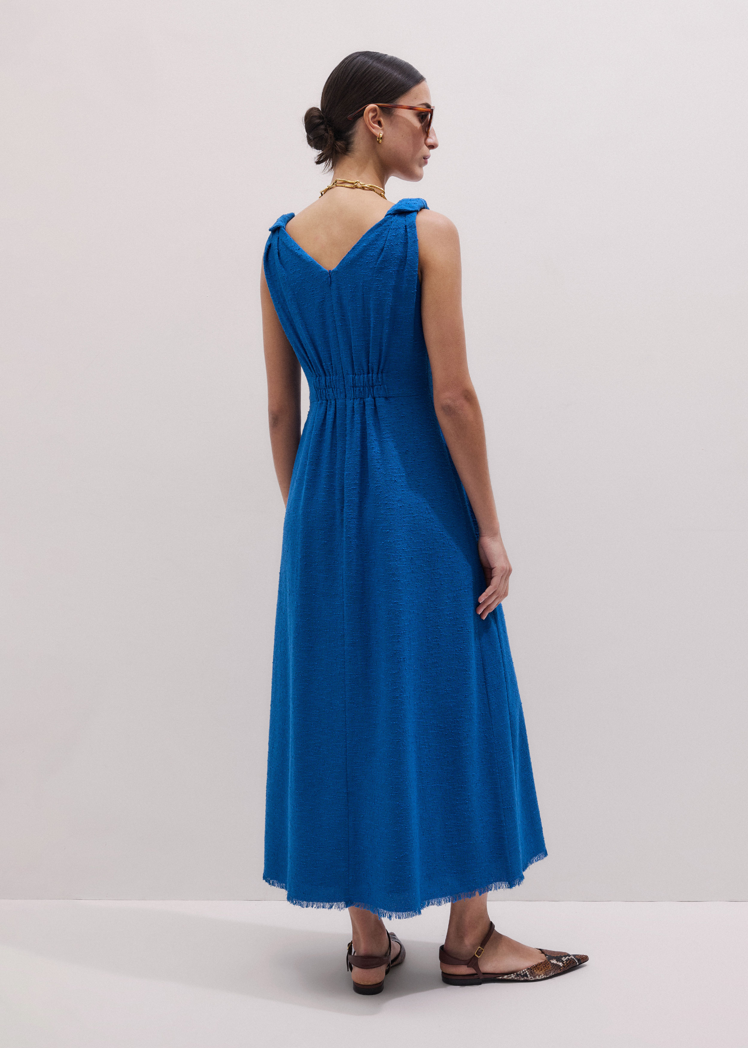 cerulean blue dress queen  DRESSX / More Dash Inc. dba DRESSX OR Model is 58 and wearing size XS Andie Italian Linen V-Neck maxi